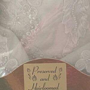 Breath taking wedding gown  purchased early 90’s. Beautifully preserved.